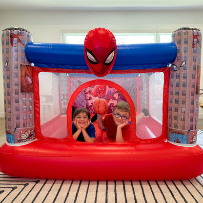 Children resting on the Soider-Man inflatable bounce house